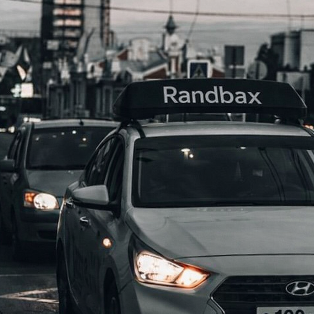 Indeginous ride hailing with international ride standards - Experience safe, reliable, and affordable rides with drivers who know your city inside out. - RandBax desktop interface showing indeginous ride hailing with international ride standards